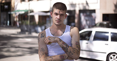 Photo of a young tattooed man printed on Velvet paper. While this paper is called velvet, the surface has an extremely flat matt surface, which should be noted before using it for pinting on.